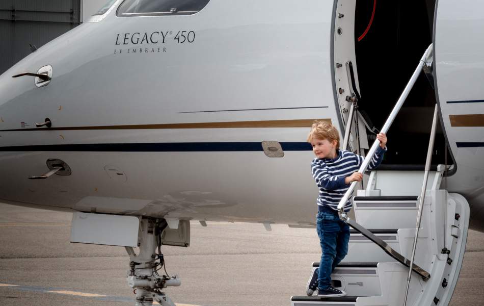 Young Boy Boards an AirSprint Private Jet