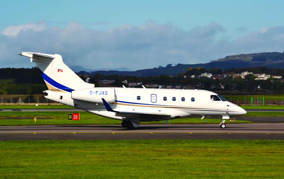 AirSprint Legacy 450 side view runway