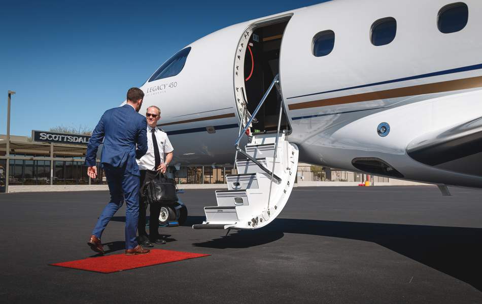 AirSprint passenger greeted by staff
