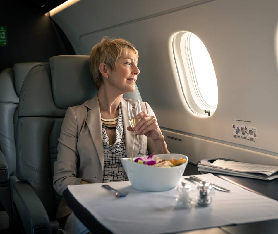 AirSprint passenger enjoying her flight