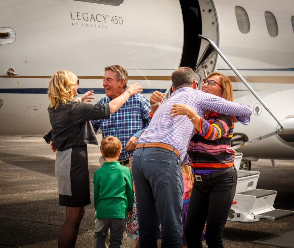 AirSprint fractional ownership passengers hugging