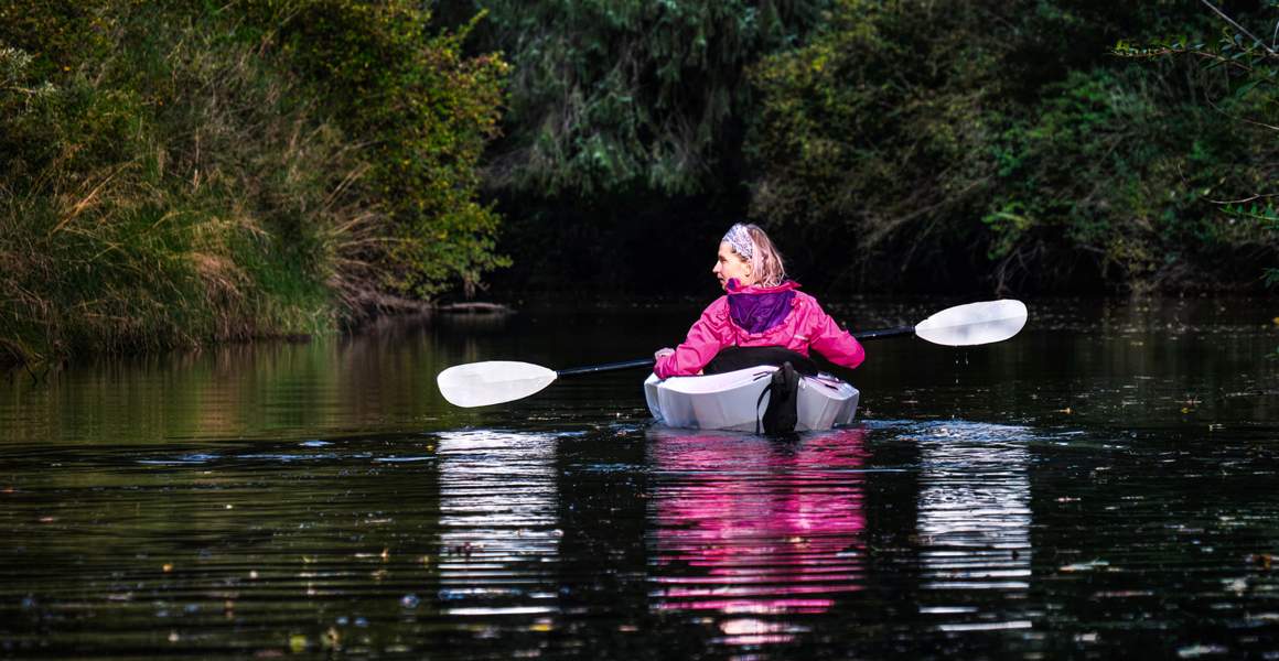 Kayaking Moments in a Calm Narrow River in Pitt Meadows | Discover AirSprint Private Aviation