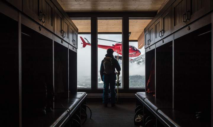 Guest Look Out Window At Helicopter | Mica Heli Skiing