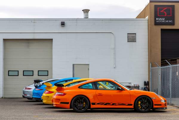 Line up of Porsche GT cars, all iterations and four generations of Porsche 911 GT3/GT3RS.